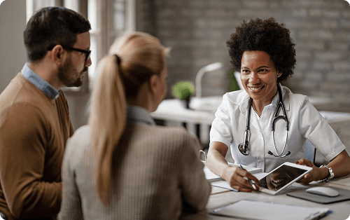 Doctor consulting with patients in a clinic